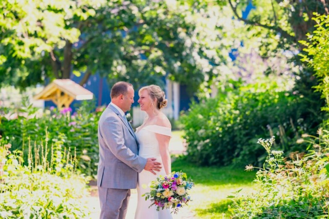 Couple in Rosewood's perennial gardens