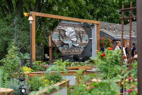 Patio and cabana bar with garden beds